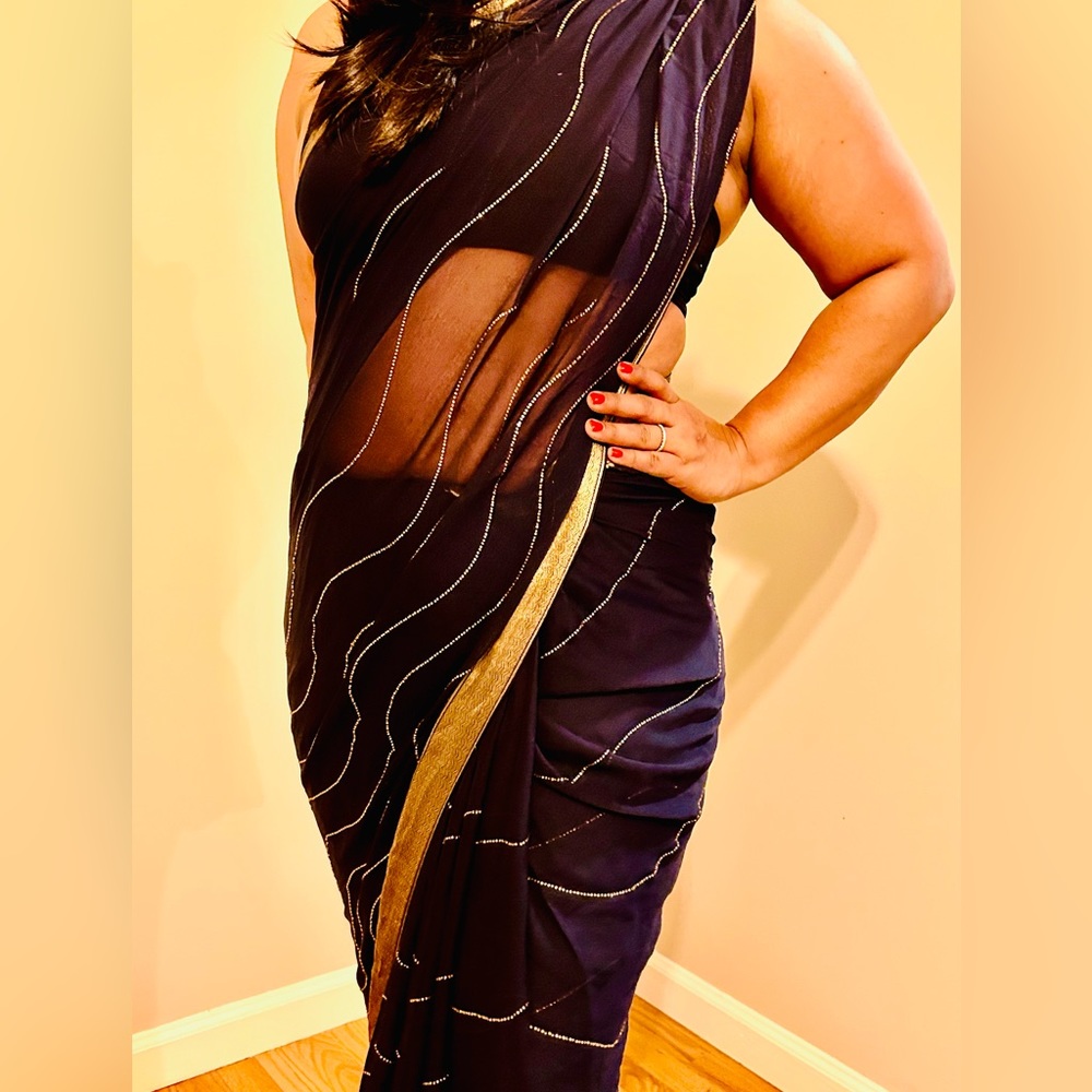 Deep bluish blackish saree with subtle bead detailing